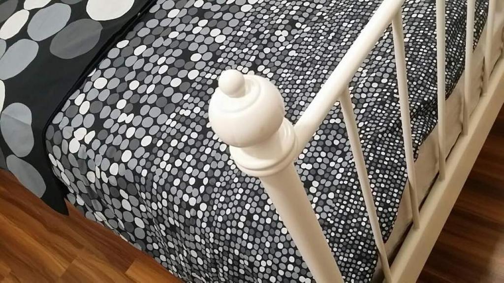 Postel nebo postele na pokoji v ubytování Bayu TAMARA RESIDENCE PUTRAJAYA