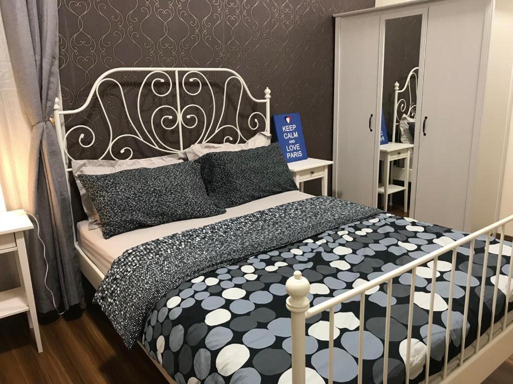 Postel nebo postele na pokoji v ubytování Bayu TAMARA RESIDENCE PUTRAJAYA
