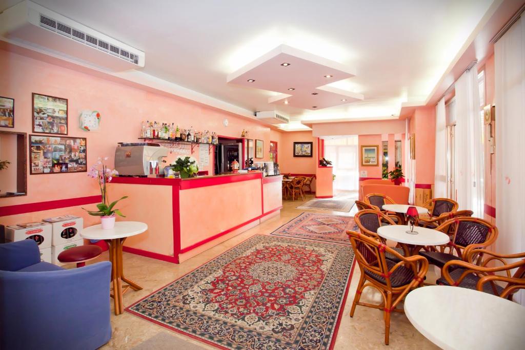 Posezení v ubytování Hotel Catto Suisse