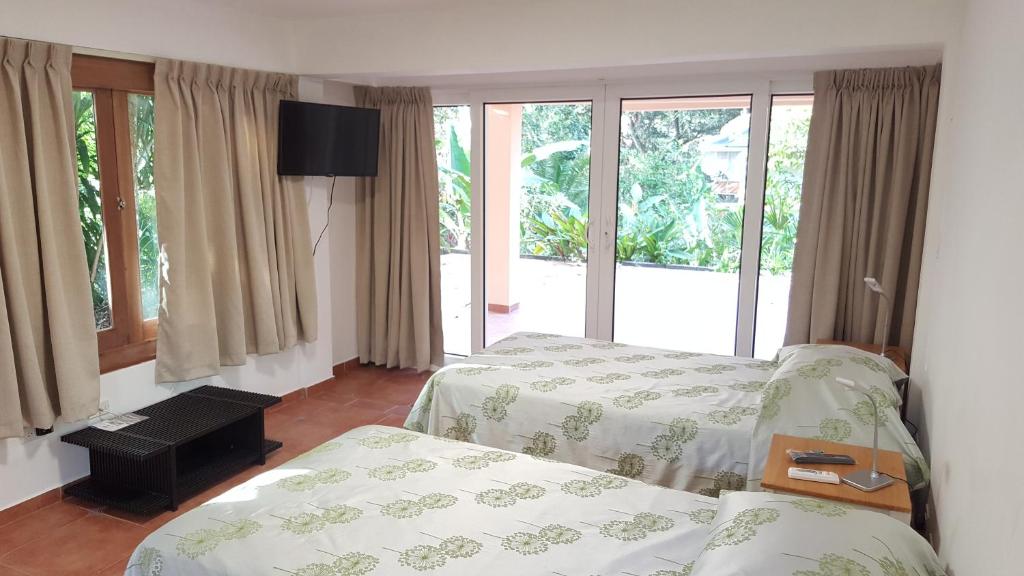 Postel nebo postele na pokoji v ubytování Gamboa Apartment Toucan y Studio Ñeque