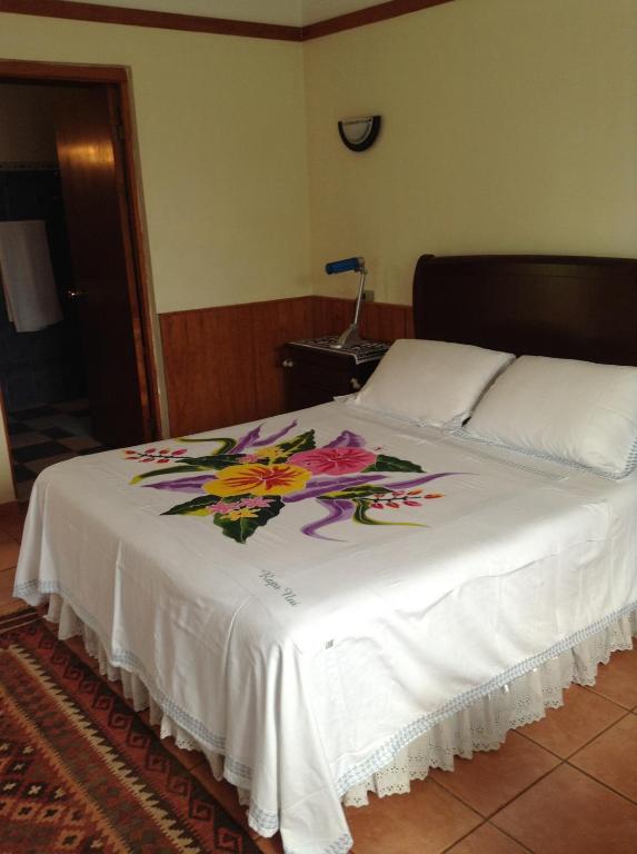 Postel nebo postele na pokoji v ubytování Hotel Taura'a