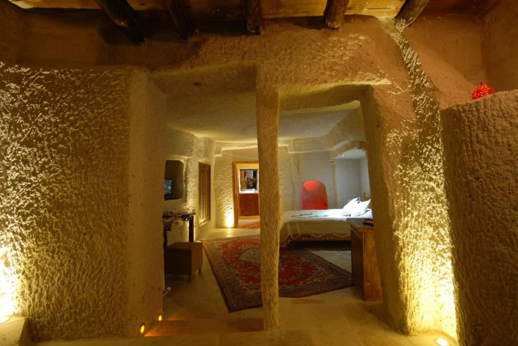 Postel nebo postele na pokoji v ubytování Arif Cave Hotel