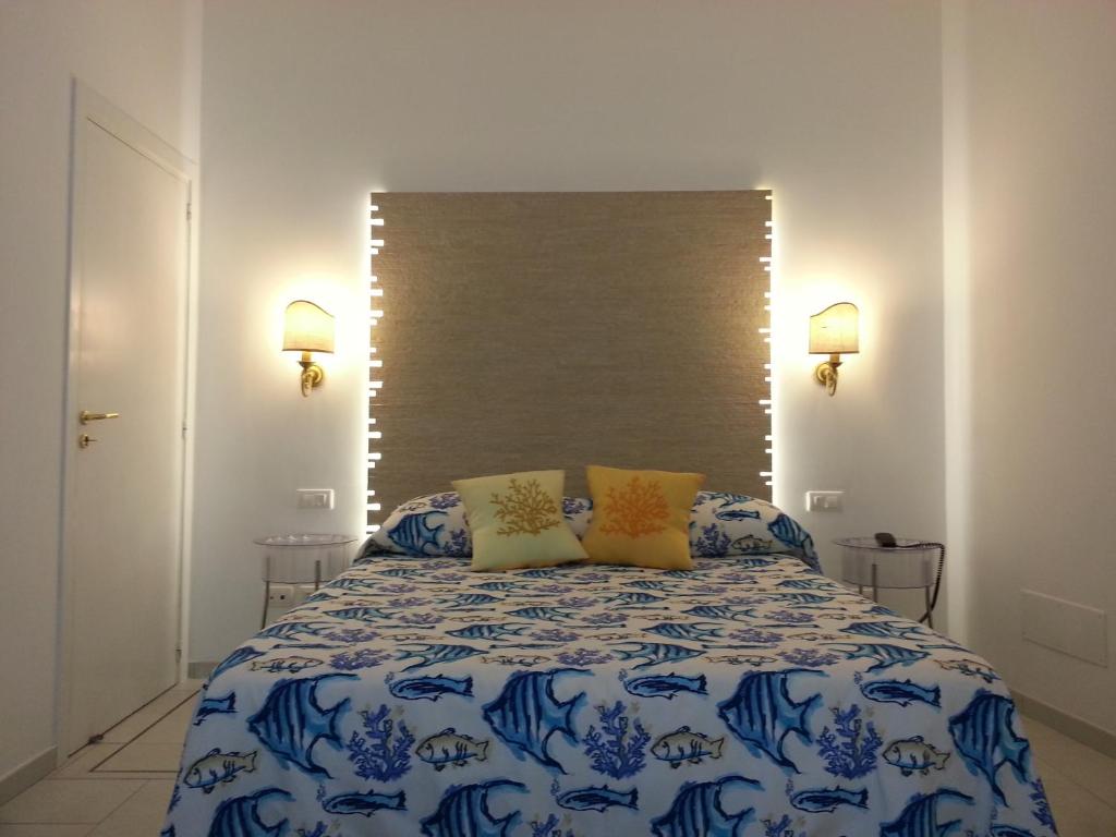 Postel nebo postele na pokoji v ubytování Fortino B&B Capri
