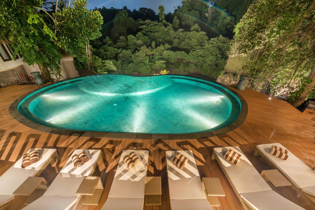 Bazén v ubytování tanadewa Resort Ubud Bali by Cross Collection nebo v jeho okolí