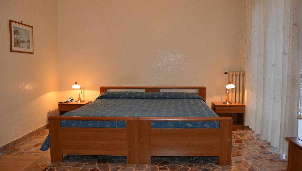 Postel nebo postele na pokoji v ubytování Hotel A-14