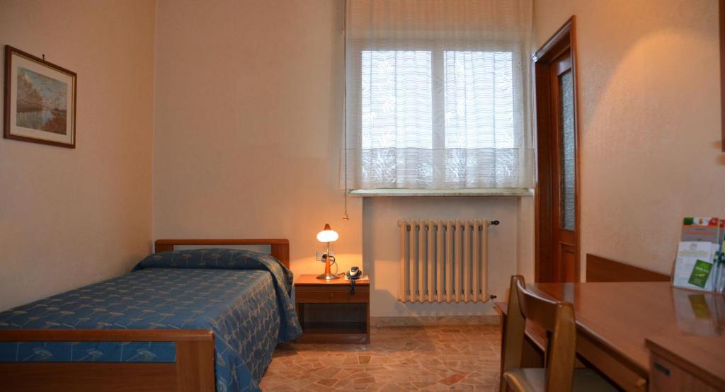 Postel nebo postele na pokoji v ubytování Hotel A-14