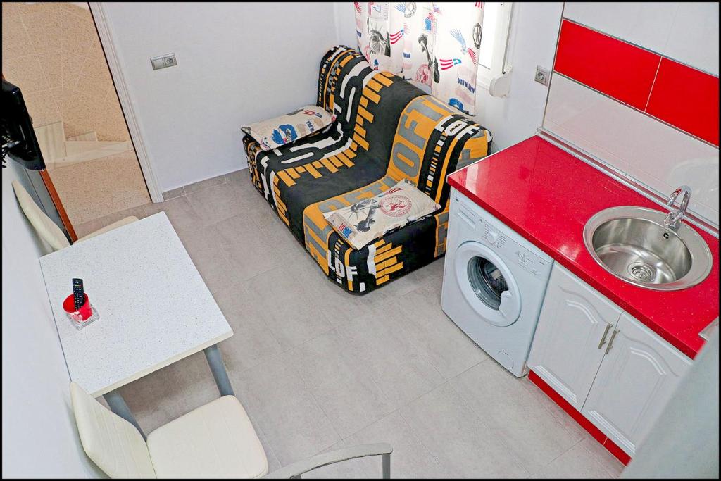 Kuchyň nebo kuchyňský kout v ubytování Apartamento acogedor con WiFi