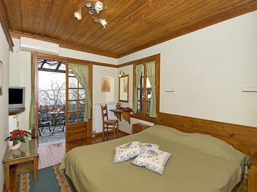 Telewizja i/lub zestaw kina domowego w obiekcie Hotel Stoikos