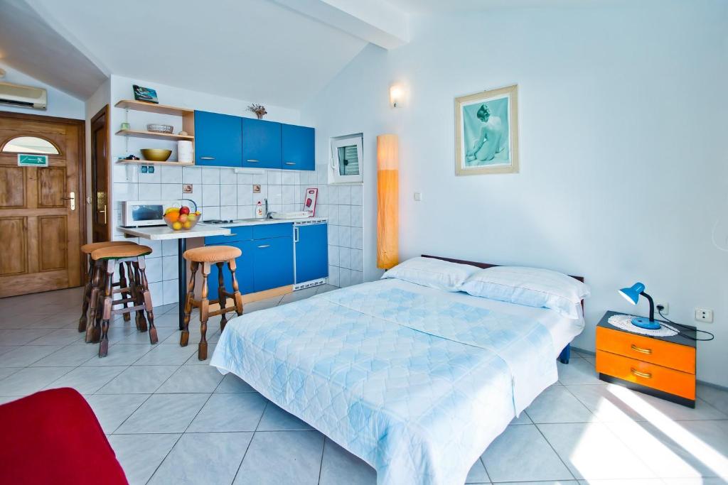 Posteľ alebo postele v izbe v ubytovaní Apartments Cloud