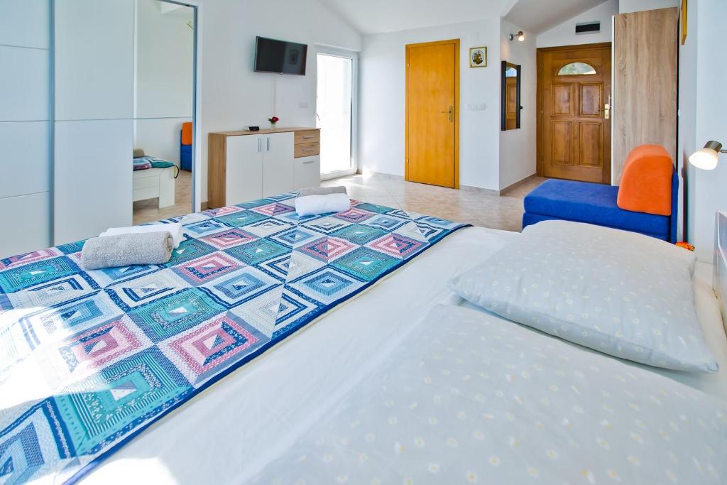 Posteľ alebo postele v izbe v ubytovaní Apartments Cloud
