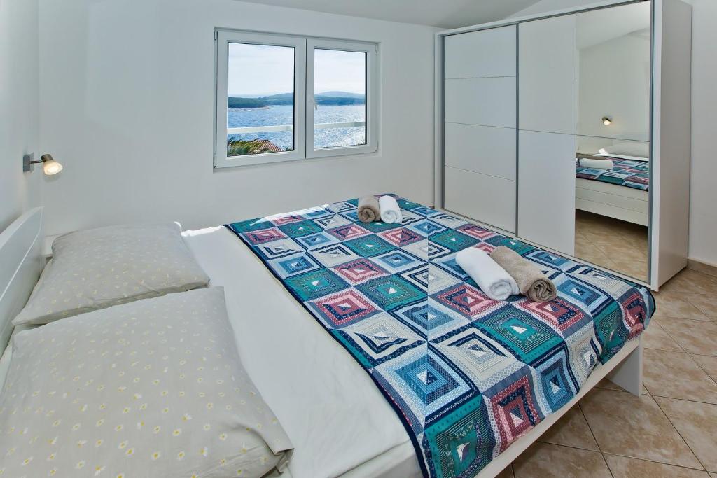 Posteľ alebo postele v izbe v ubytovaní Apartments Cloud