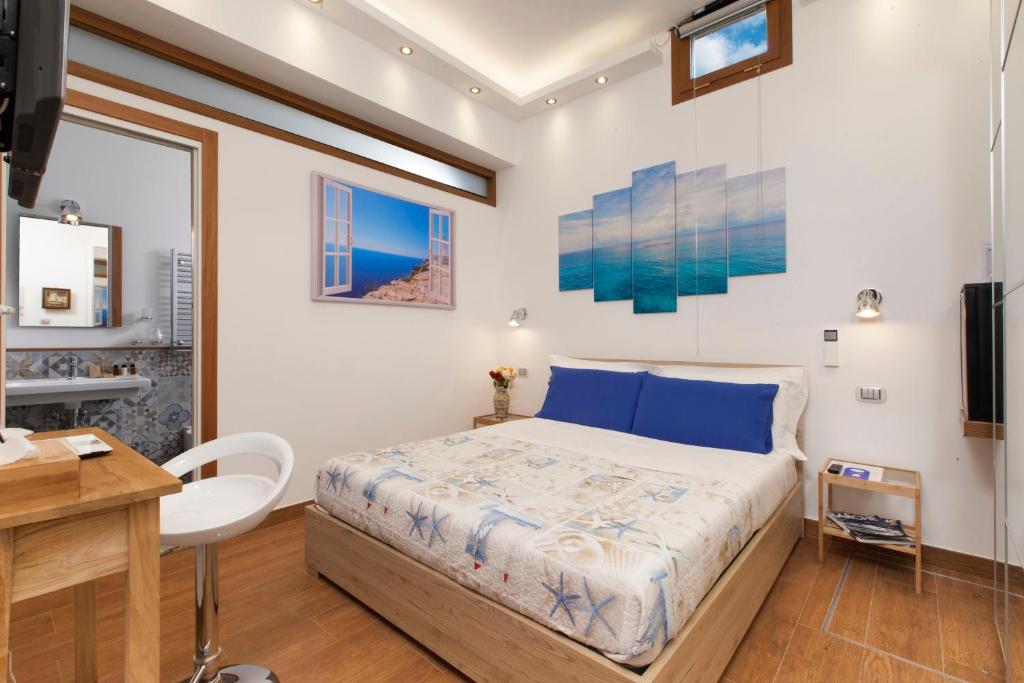 Postel nebo postele na pokoji v ubytování La Terrazza 38