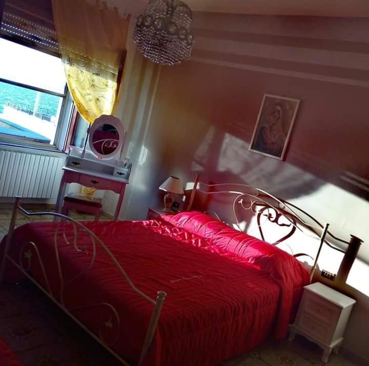 Postel nebo postele na pokoji v ubytování B&B La Felicità