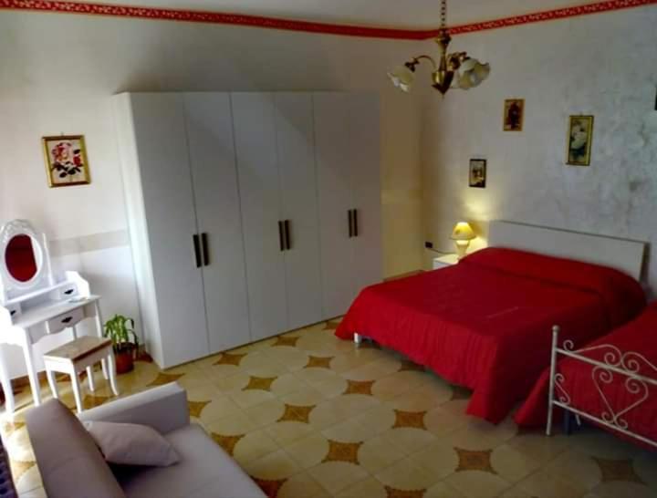Postel nebo postele na pokoji v ubytování B&B La Felicità