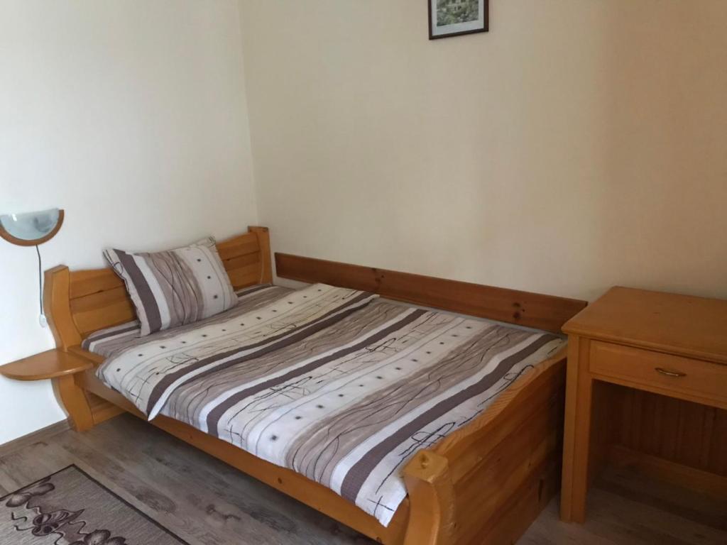 Postel nebo postele na pokoji v ubytování Hadji Georgi Hotel