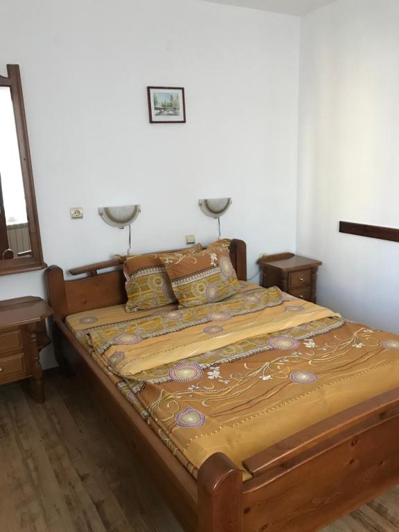 Postel nebo postele na pokoji v ubytování Hadji Georgi Hotel