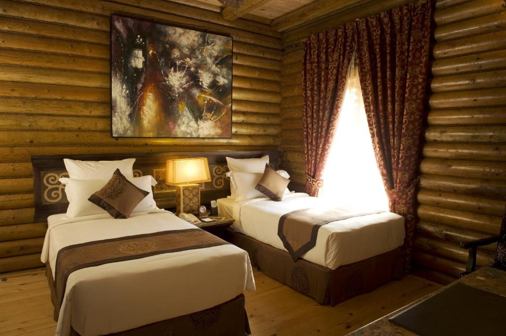 Postel nebo postele na pokoji v ubytování Philea Resort & Spa