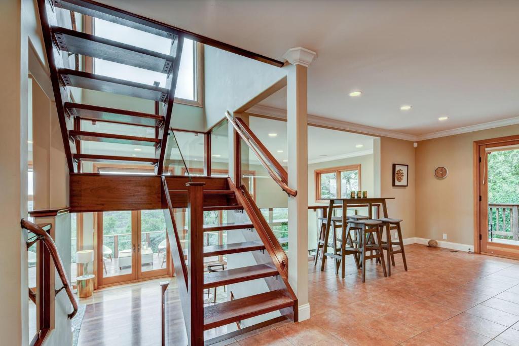 a spiral staircase in a home with a dining room at Napa Valley and Guest House Home in Napa