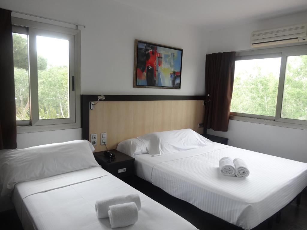 Postel nebo postele na pokoji v ubytování Hotel 170