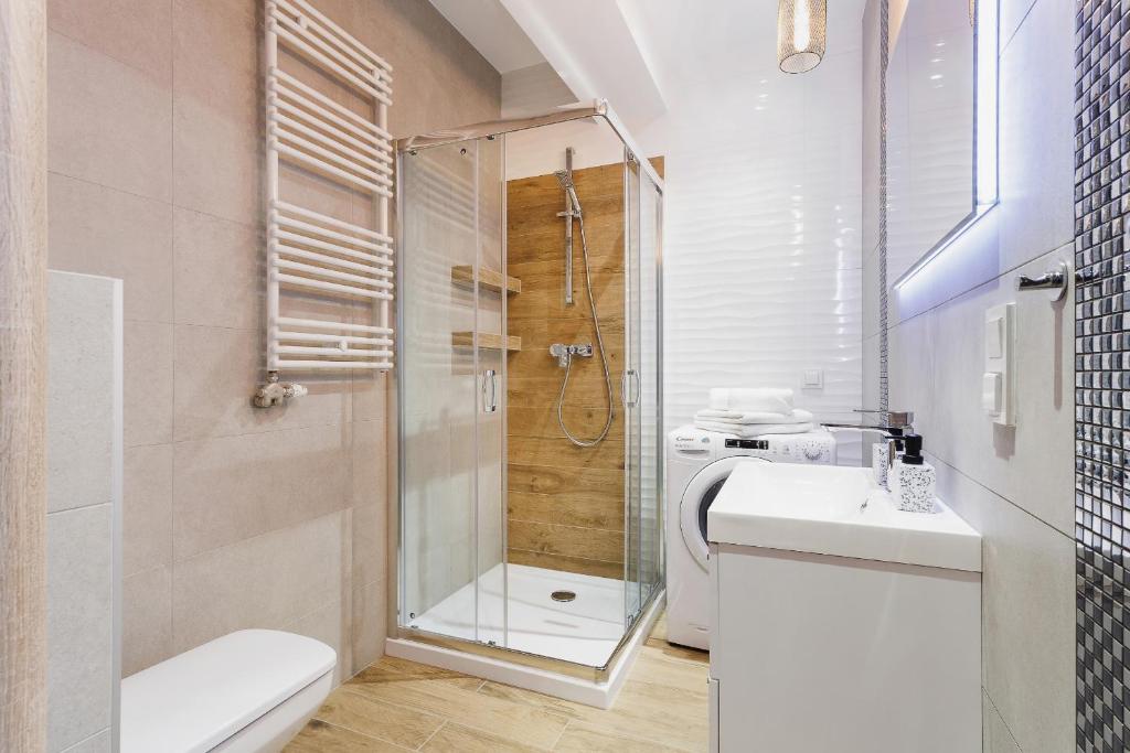 Kúpeľňa v ubytovaní Tauron Arena Elegant Apartment Dąbska by Noclegi Renters