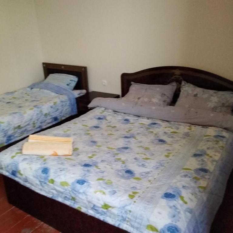 Postel nebo postele na pokoji v ubytování Goga Guesthouse