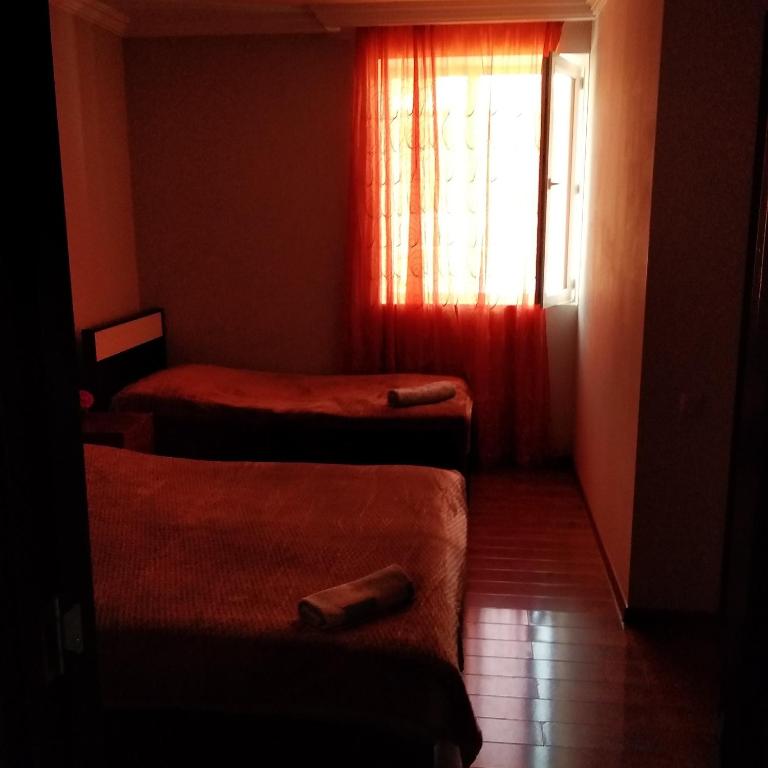 Postel nebo postele na pokoji v ubytování Goga Guesthouse
