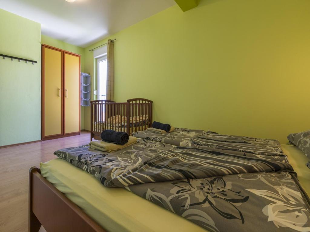 Posteľ alebo postele v izbe v ubytovaní BRUNO