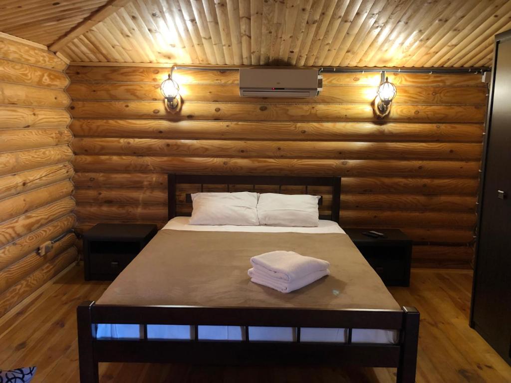 Postel nebo postele na pokoji v ubytování AKVALIS комплекс для отдыха