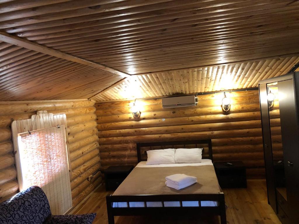 Postel nebo postele na pokoji v ubytování AKVALIS комплекс для отдыха