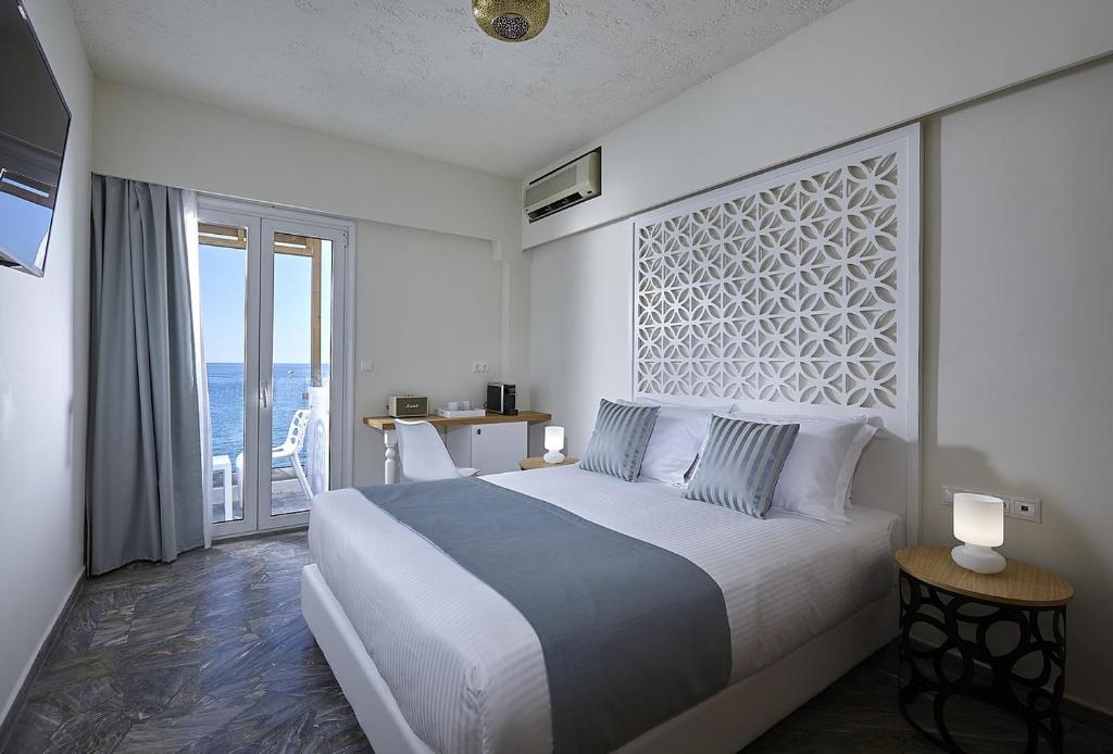 Posteľ alebo postele v izbe v ubytovaní Vasia Boulevard Hotel (Adults Only)