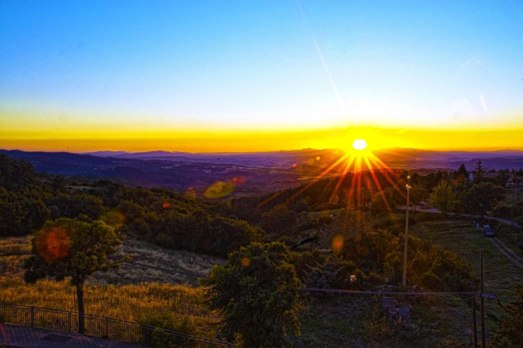 The sunrise or sunset as seen from a szállodákat or nearby