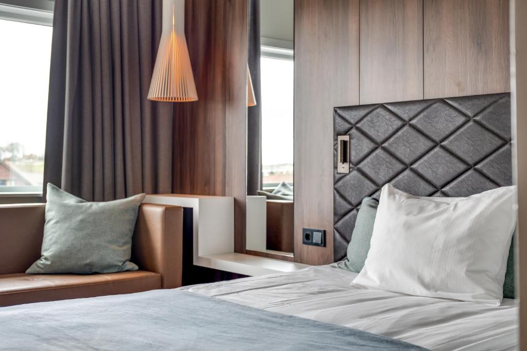 Quality Airport Hotel Stavanger tesisinde bir odada yatak veya yataklar
