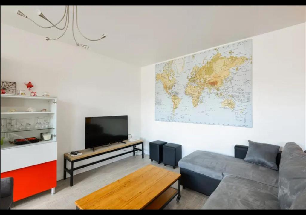 TV a/nebo společenská místnost v ubytování Lovely Appart