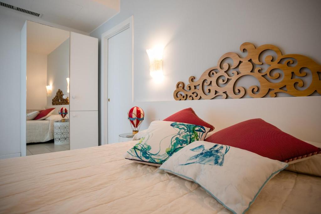 Postel nebo postele na pokoji v ubytování Hotel Albatros