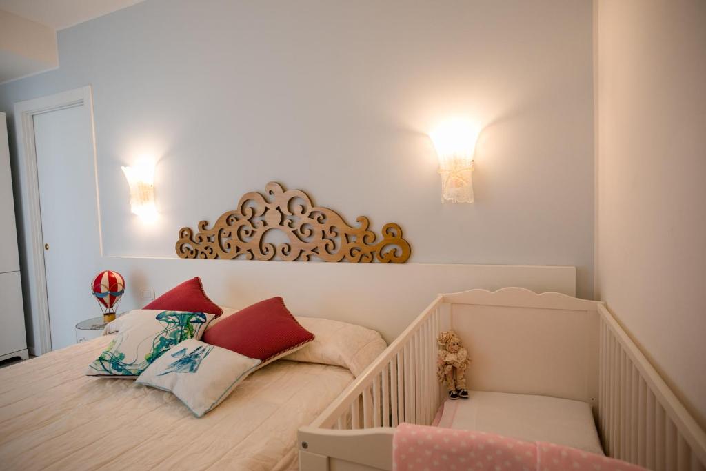Postel nebo postele na pokoji v ubytování Hotel Albatros