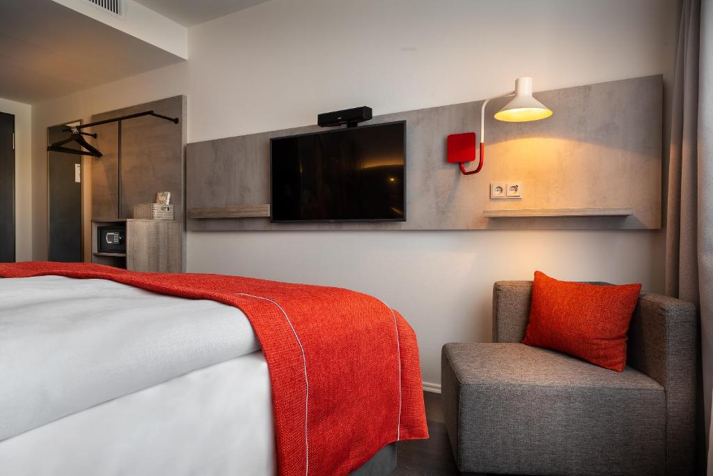 Postel nebo postele na pokoji v ubytování Holiday Inn - the niu, Hide Berlin Friedrichshain by IHG