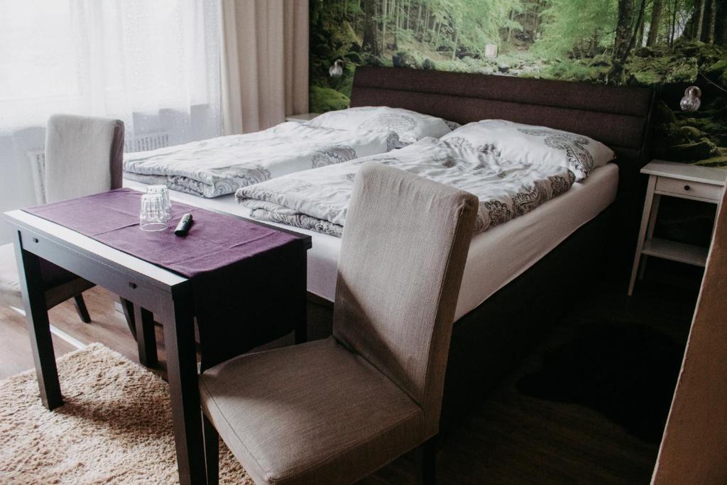 Postel nebo postele na pokoji v ubytování Pension Leprich
