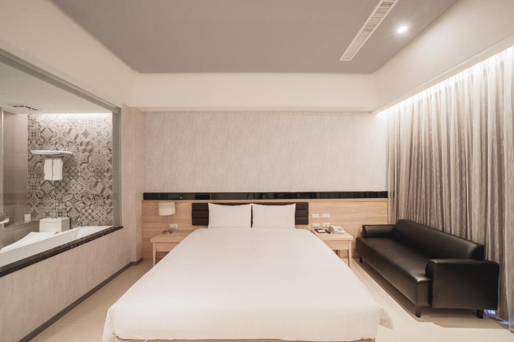 Postel nebo postele na pokoji v ubytování Larchotel