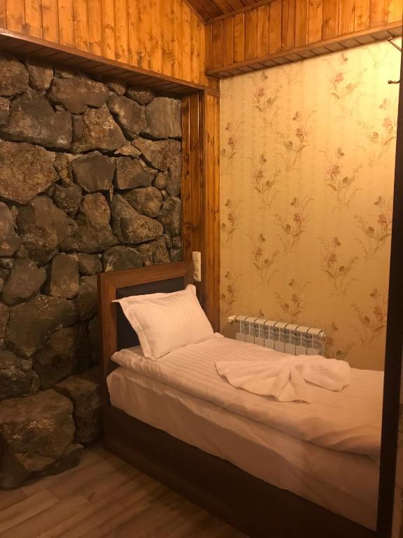 Postel nebo postele na pokoji v ubytování Eridana Hotel