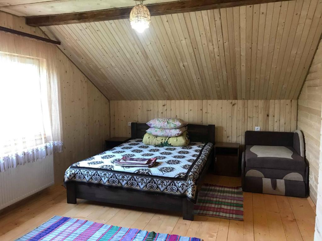 Postel nebo postele na pokoji v ubytování Rukavichka