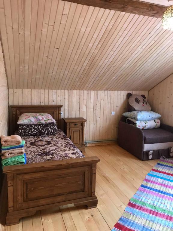 Postel nebo postele na pokoji v ubytování Rukavichka