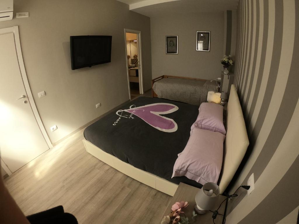 Łóżko lub łóżka w pokoju w obiekcie La Casetta Narni