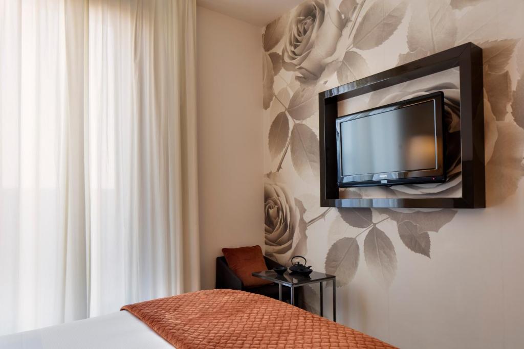 TV a/nebo společenská místnost v ubytování Starhotels Echo