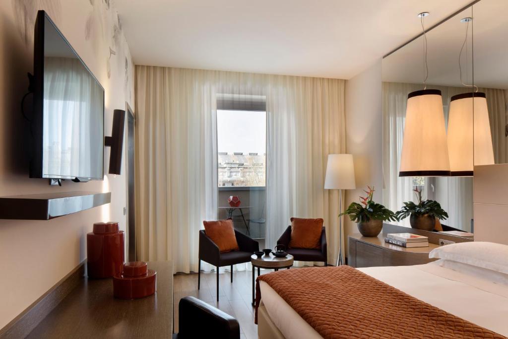 TV a/nebo společenská místnost v ubytování Starhotels Echo