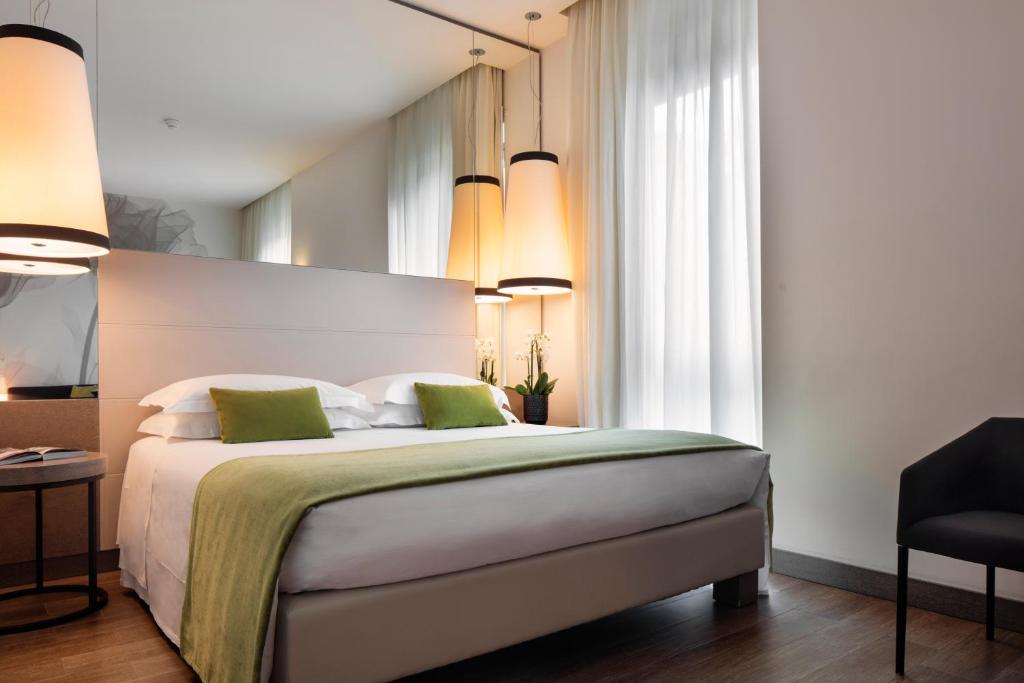 Postel nebo postele na pokoji v ubytování Starhotels Echo