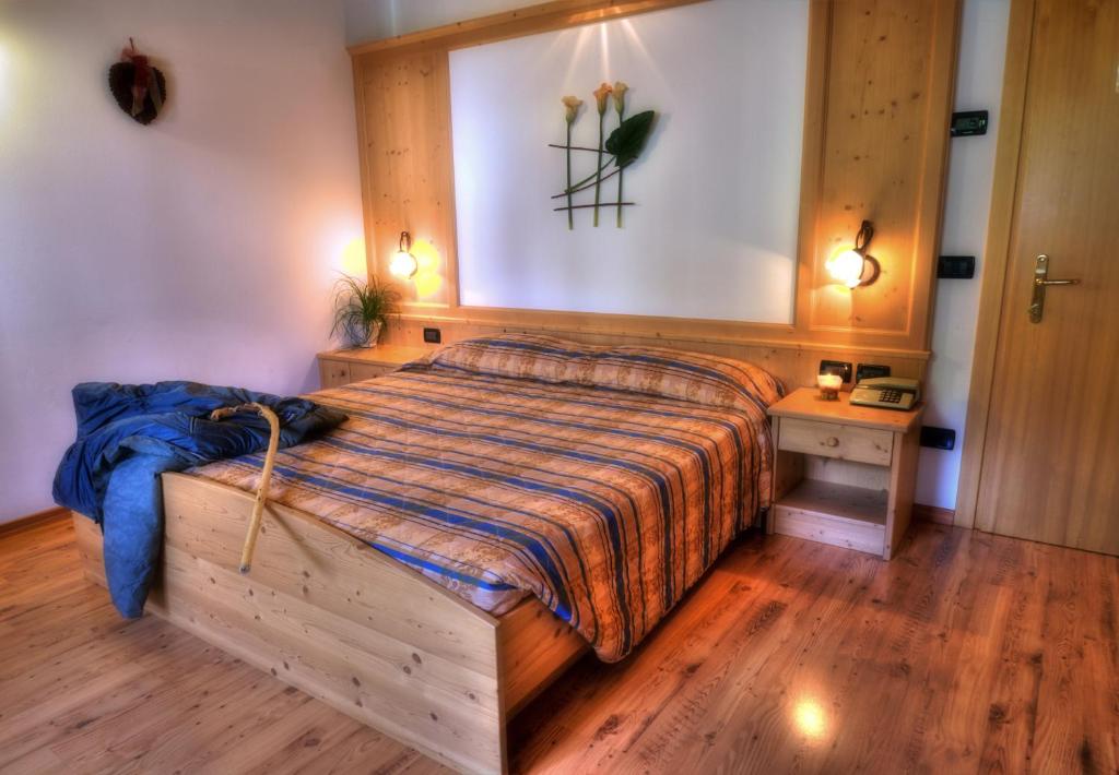 Postel nebo postele na pokoji v ubytování Caminetto Mountain Resort