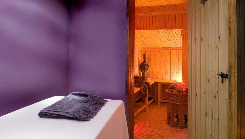 Postel nebo postele na pokoji v ubytování Riad Ayadina & SPA