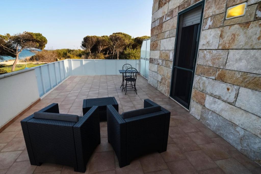 Balcone o terrazza di B&B Neptunia fronte mare