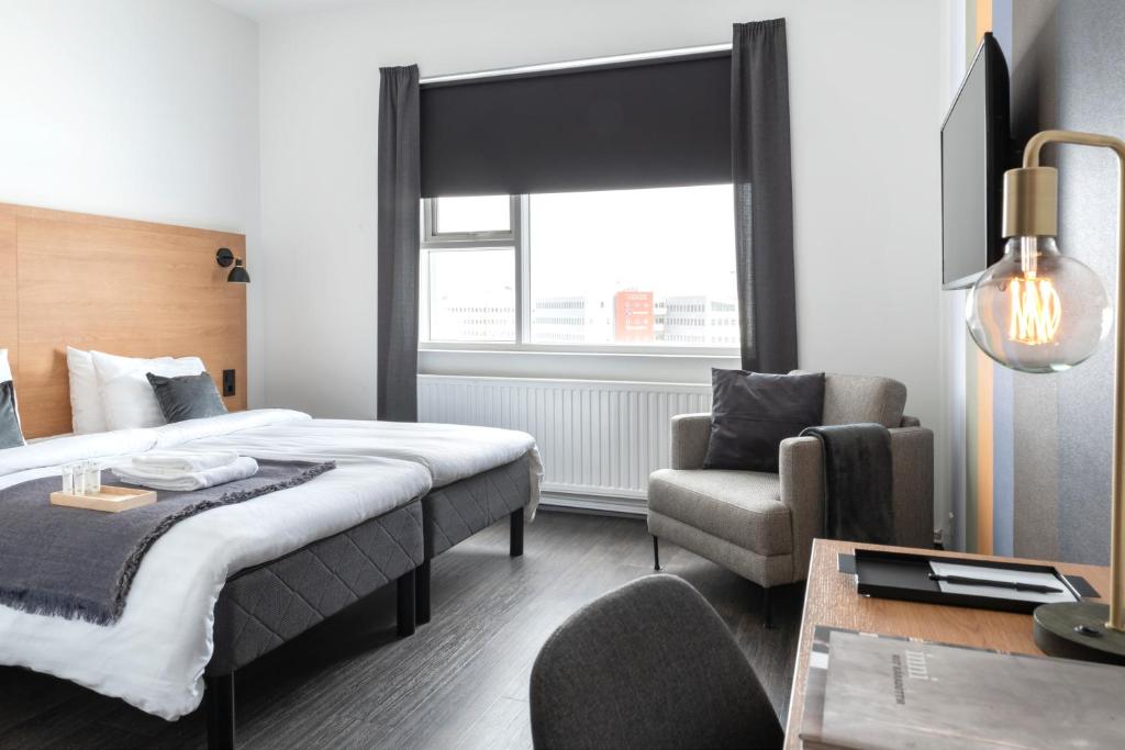 Vuode tai vuoteita majoituspaikassa 201 Hotel