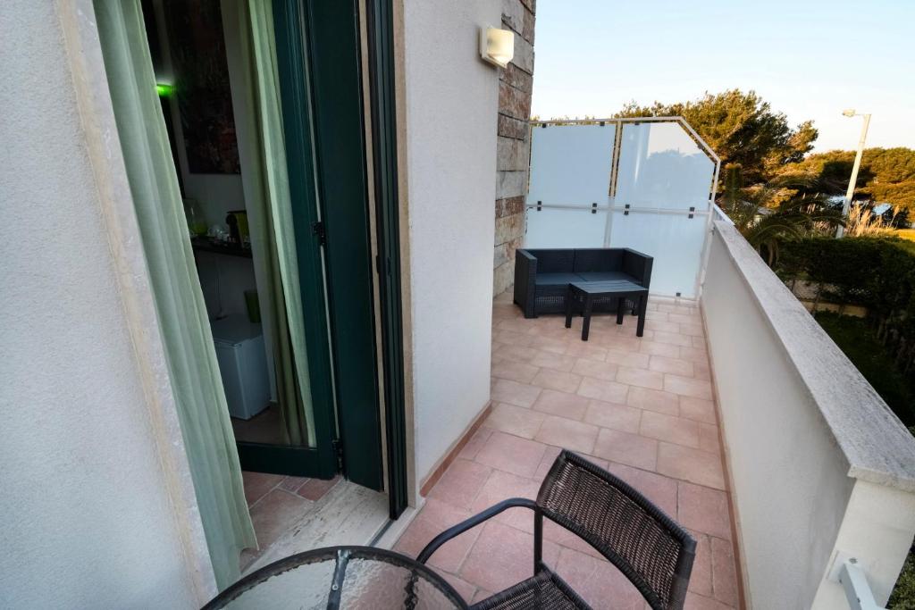 Balcone o terrazza di B&B Neptunia fronte mare